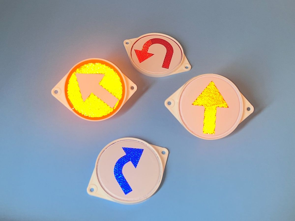 Arrow disks reflecting light — glowing